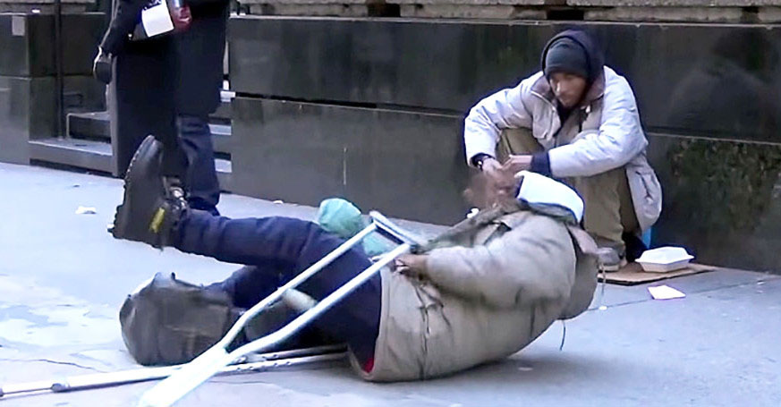 Homeless man falls