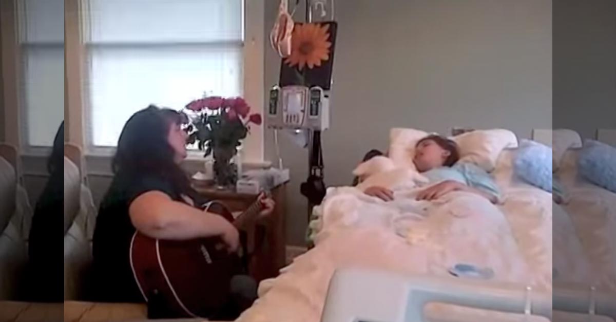 Mother Sings Song to Her Dying Daughter