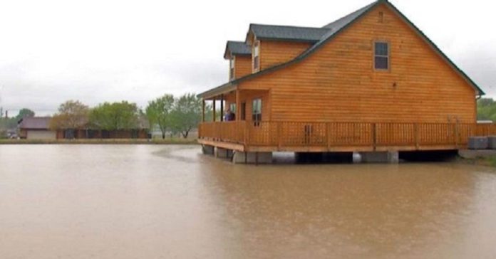 man in Oklahoma built a house on a pond that has a fishing hole in the living room